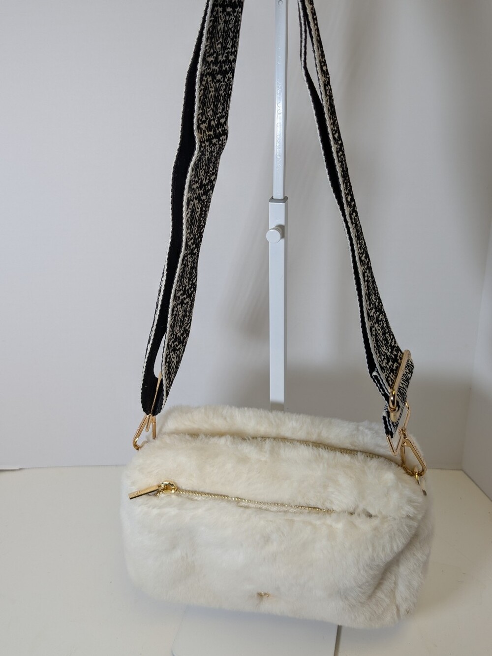 Nanette Lepore Cream Faux Fur Crossbody with Black-and-Cream Patterned Strap